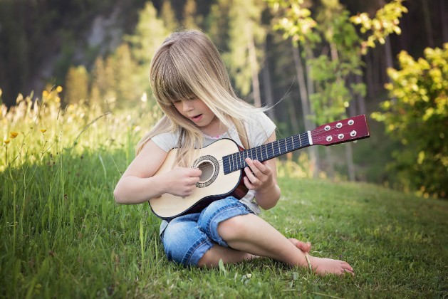 How should kids learn to play the guitar?