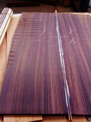 Solid or laminated wood guitar